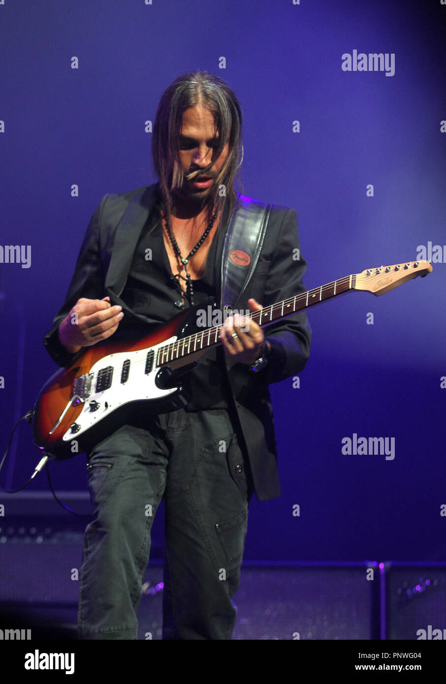 Sergio Vallin with the Mexican rock group Mana performs in concert at the American Airlines Arena in Miami on July 7, 2011. Stock Photo