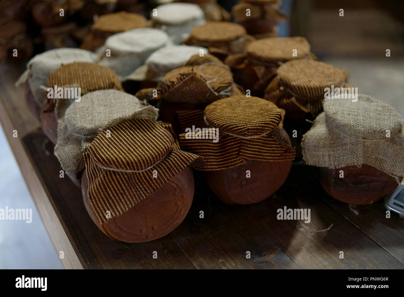 Vintage clay pots of jam and honey Stock Photo Alamy