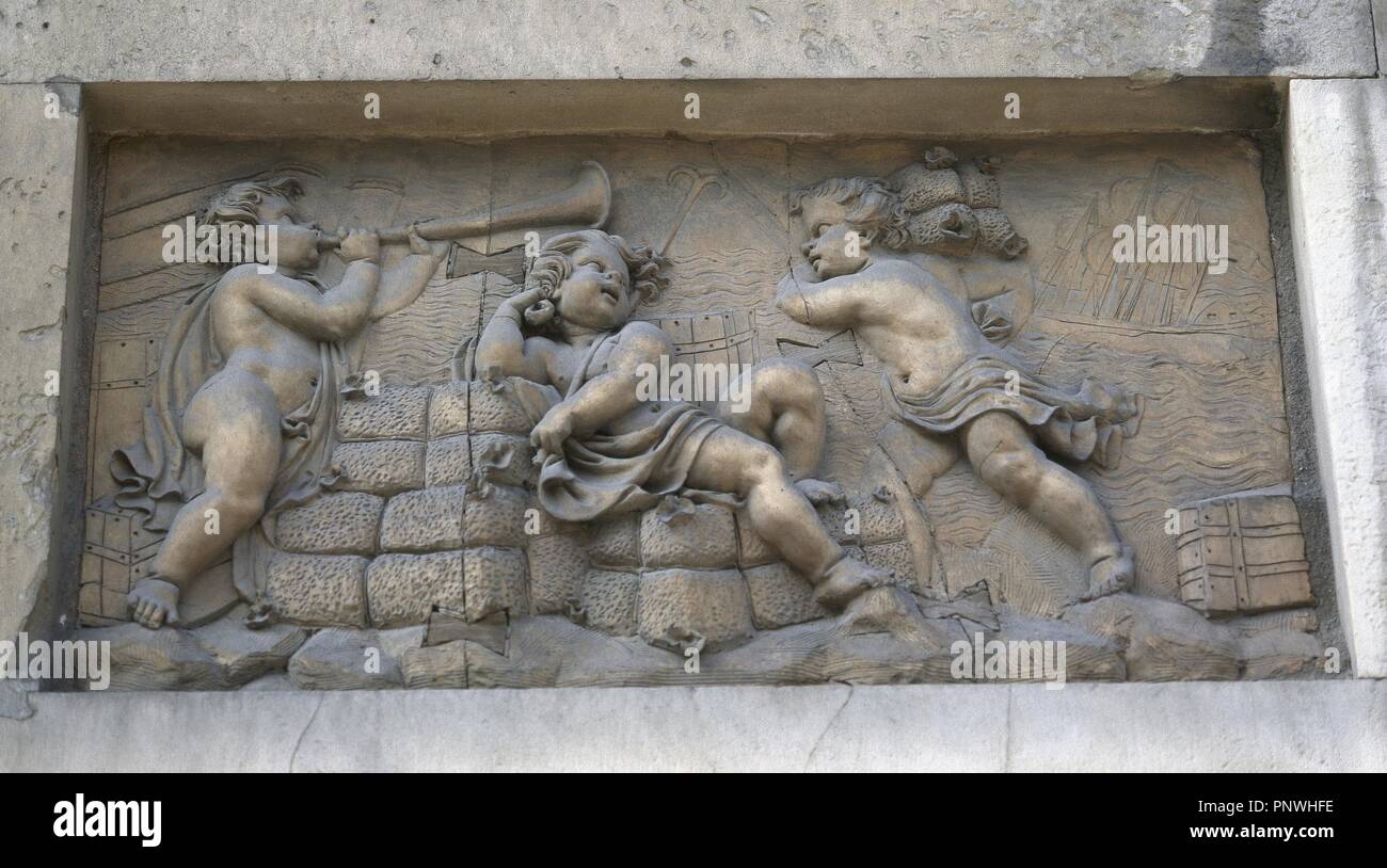 Spain. Barcelona. Porxos d'en Xifre . Edifice neo-classical build commanded by Josep Xifre  i Cases. 1836. It was named 'Porxos' after the long arcades encircling the buildings. Detail relief. Allegory of the Sea. Stock Photo