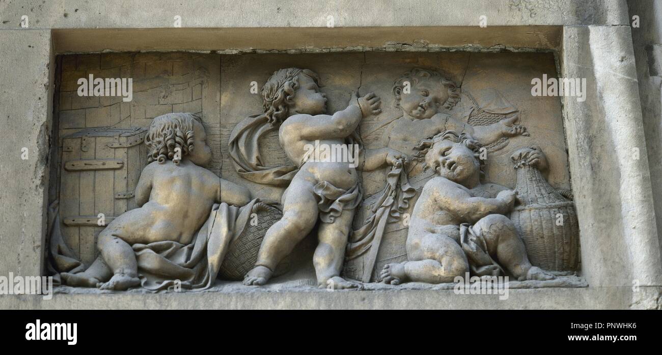 Spain. Barcelona. Porxos d'en Xifre . Edifice neo-classical build commanded by Josep Xifre  i Cases. 1836. It was named 'Porxos' after the long arcades encircling the buildings. Detail relief. Allegory of the Sea. Stock Photo