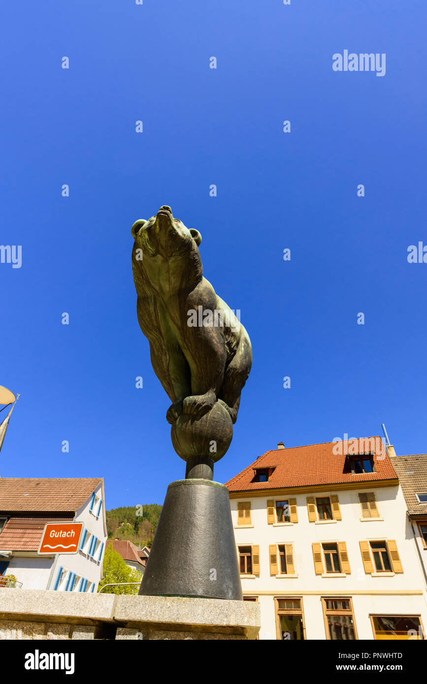 The bear sculpture on the Bärenplatz at the Gutach in the village Hornberg in the Black Forest Stock Photo