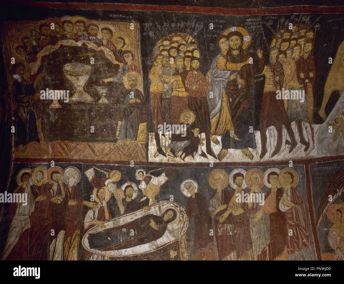 ARTE BIZANTINO. TURQUIA. IGLESIA DE SAN JUAN (S. XI). Pintura mural que decora las paredes de la iglesia excavada en la roca. Representa escenas de la vida de Cristo: 'LA ULTIMA CENA, EL BESO DE JUDAS, Y LA DORMICION DE LA VIRGEN'. DÜLSEHIR. Región de la CAPADOCIA. Stock Photo