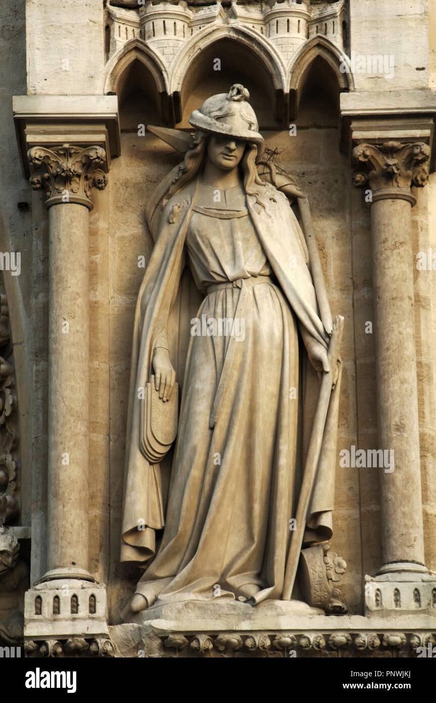 France. Pari s. Notre Dame cathedral. Portal of St. Anne. Synagogue. AllegorycaI statue depicted with his eyes covered, her crown falling on the floor, the tables of the law reversed, falling from his hand, and holds a  banner of Judaism, which is broken. The dejected pose try to suggest defeat. Stock Photo