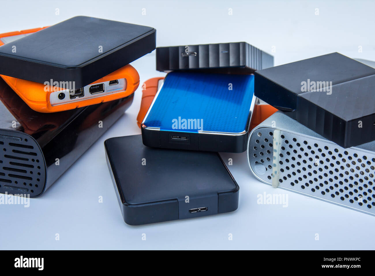 different kinds of external computer storage hard drives isolated on white background Stock