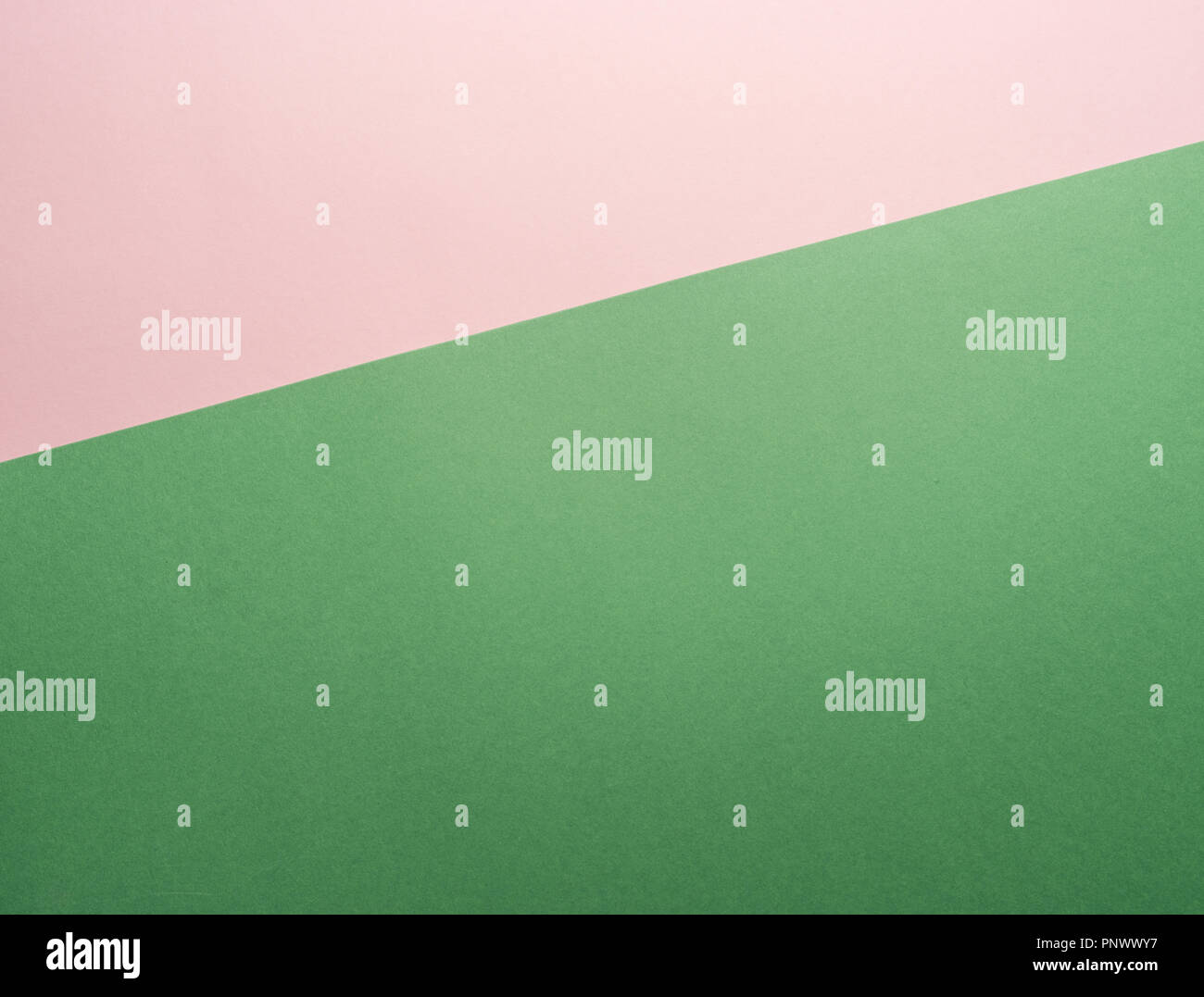 Paper background of two colors green and pink Stock Photo Alamy