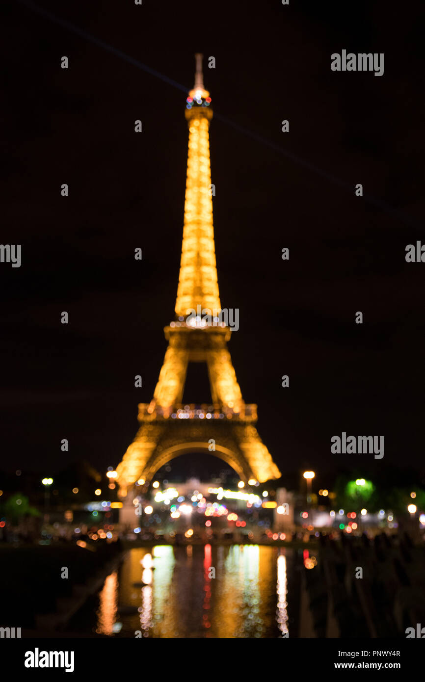 Soft bokeh of the eiffel tower at night Stock Photo