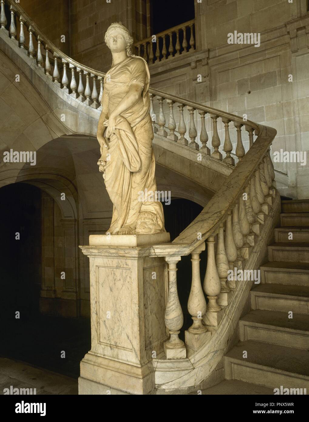 The Commerce. 1802. Allegorical sculpture by Salvador Gurri Corominas (1749-1819) at the foot of the staircase of honor at Casa Llotja de Mar. Marble. Barcelona. Catalonia. Spain. Stock Photo