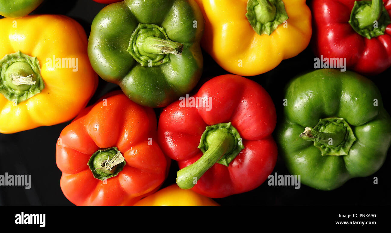 Ripe peppers of different color Stock Photo - Alamy