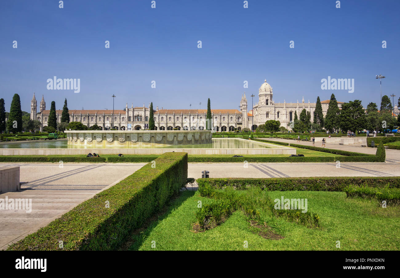Empire Square with the fountain in the center and Jeronimos Monastery on the background. Lisbon, Portugal Stock Photo