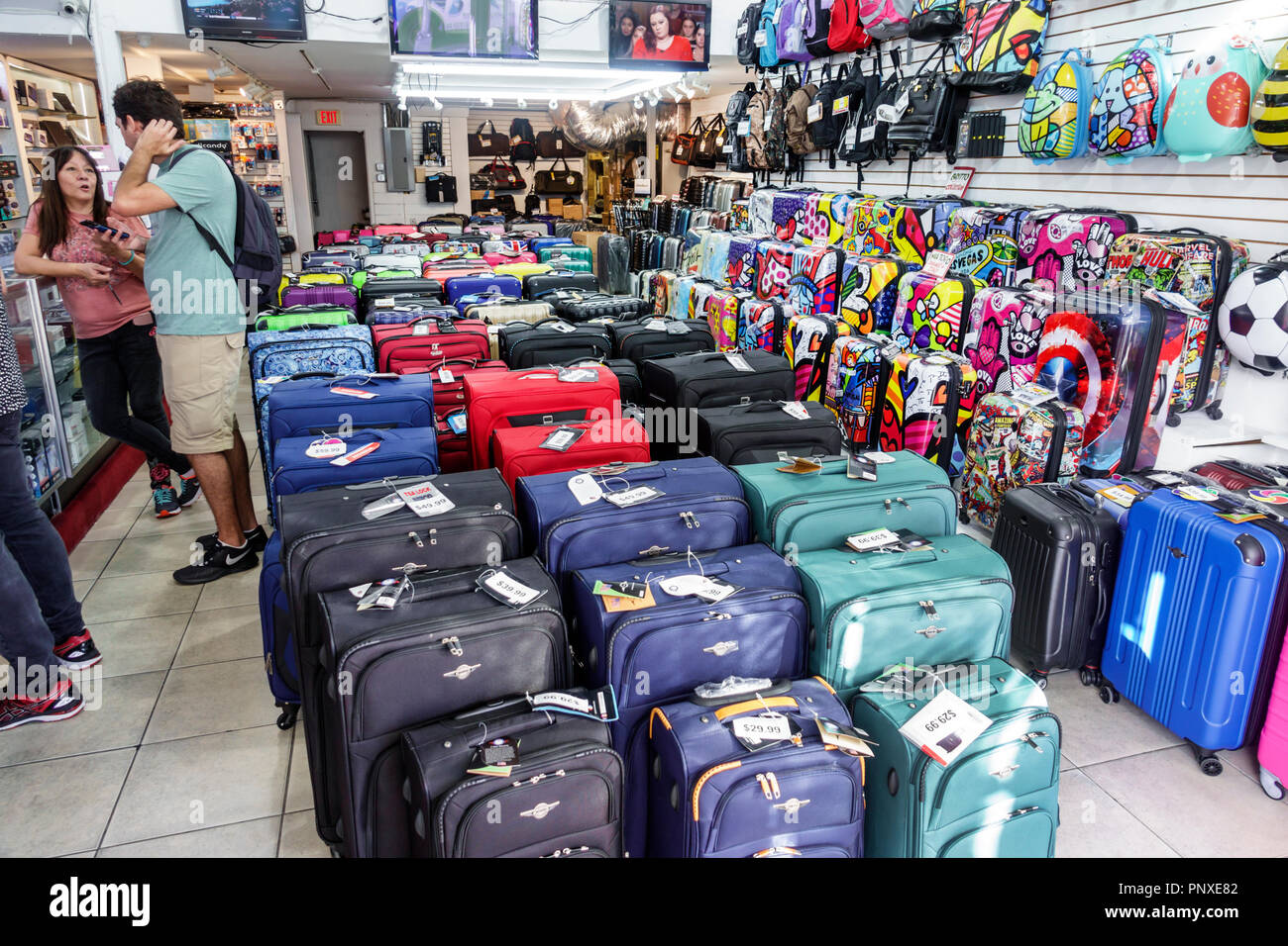 Miami Beach Florida,Lincoln Road,luggage suitcases,product products display sale,store,inside interior,business,visitors travel traveling tour tourist Stock Photo