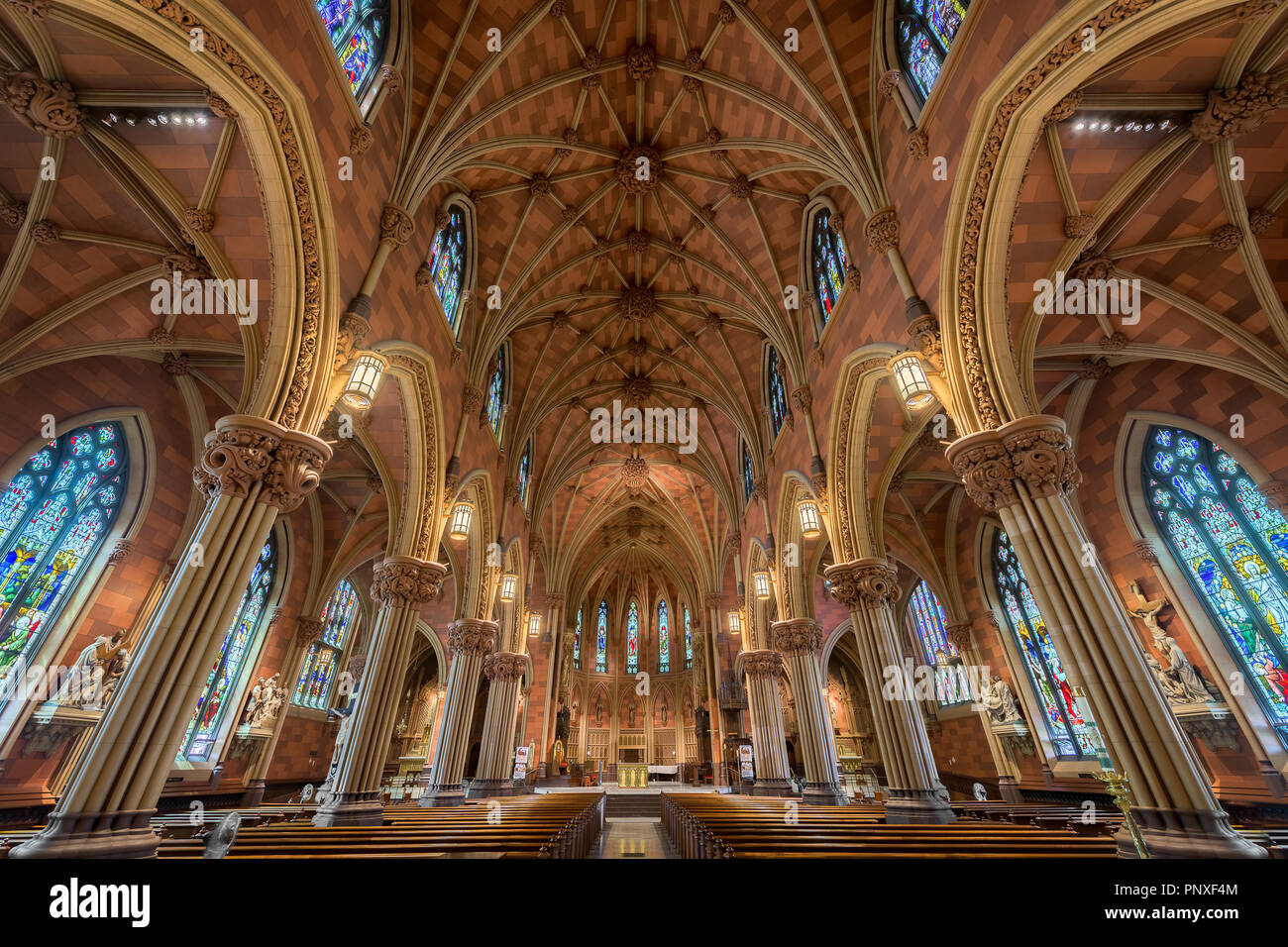 Stained glass windows and ceiling inside the historic Cathedral of the