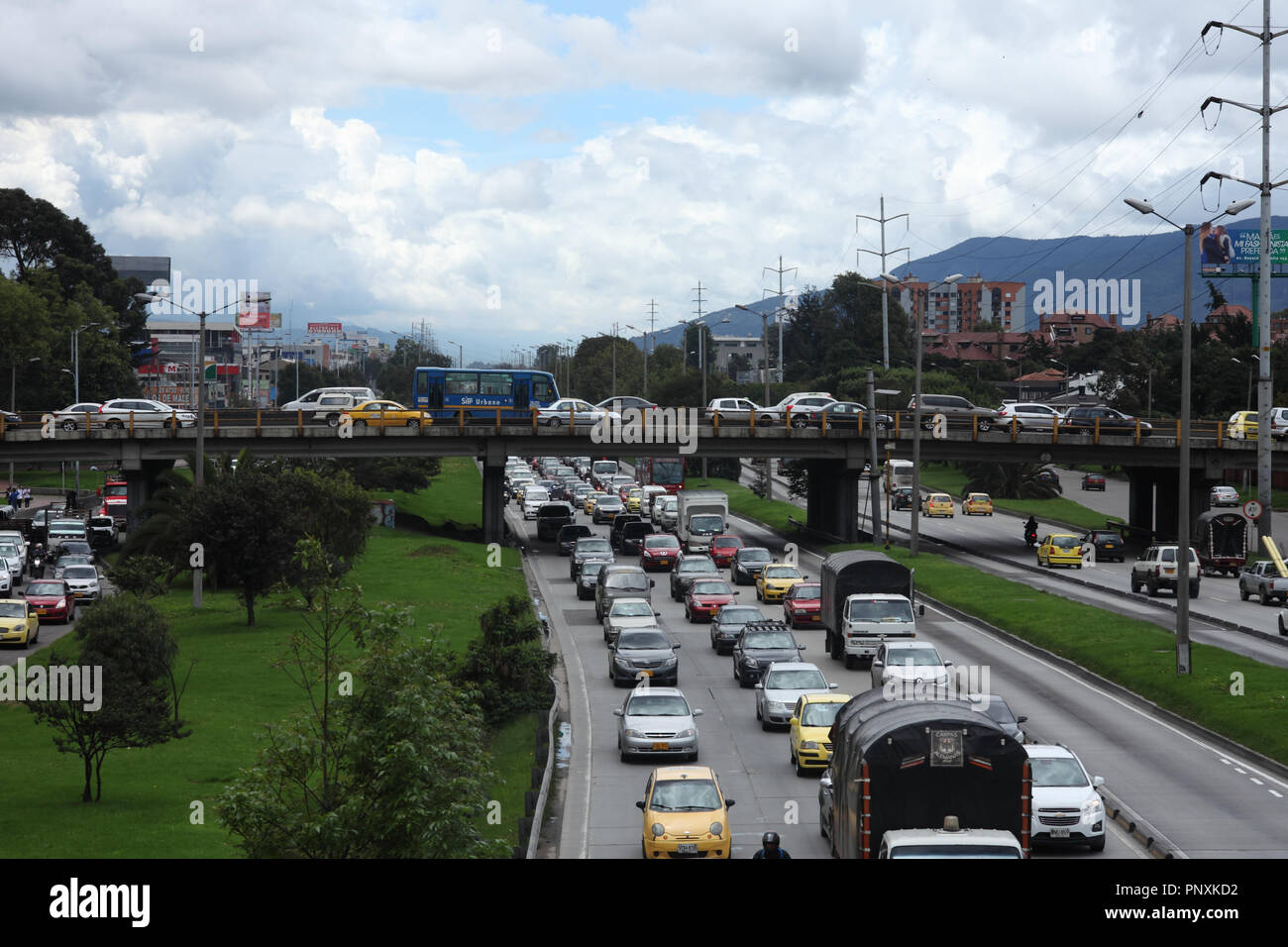 Bogota, Colombia - May 17, 2017: The traffic on the Southbound carriageway is virtually bumper to bumper. The Bridge across the Autopista. Stock Photo