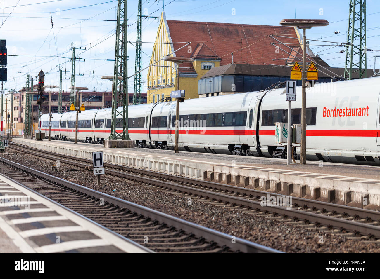 FUERTH / GERMANY - MARCH 11, 2018: ICE 3, intercity-Express train from Deutsche Bahn passes train station fuerth in germany. Stock Photo