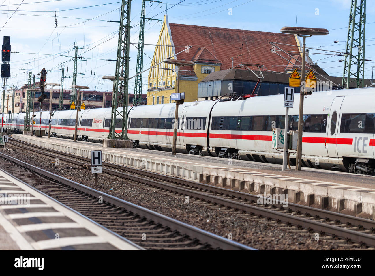 FUERTH / GERMANY - MARCH 11, 2018: ICE 3, intercity-Express train from Deutsche Bahn passes train station fuerth in germany. Stock Photo