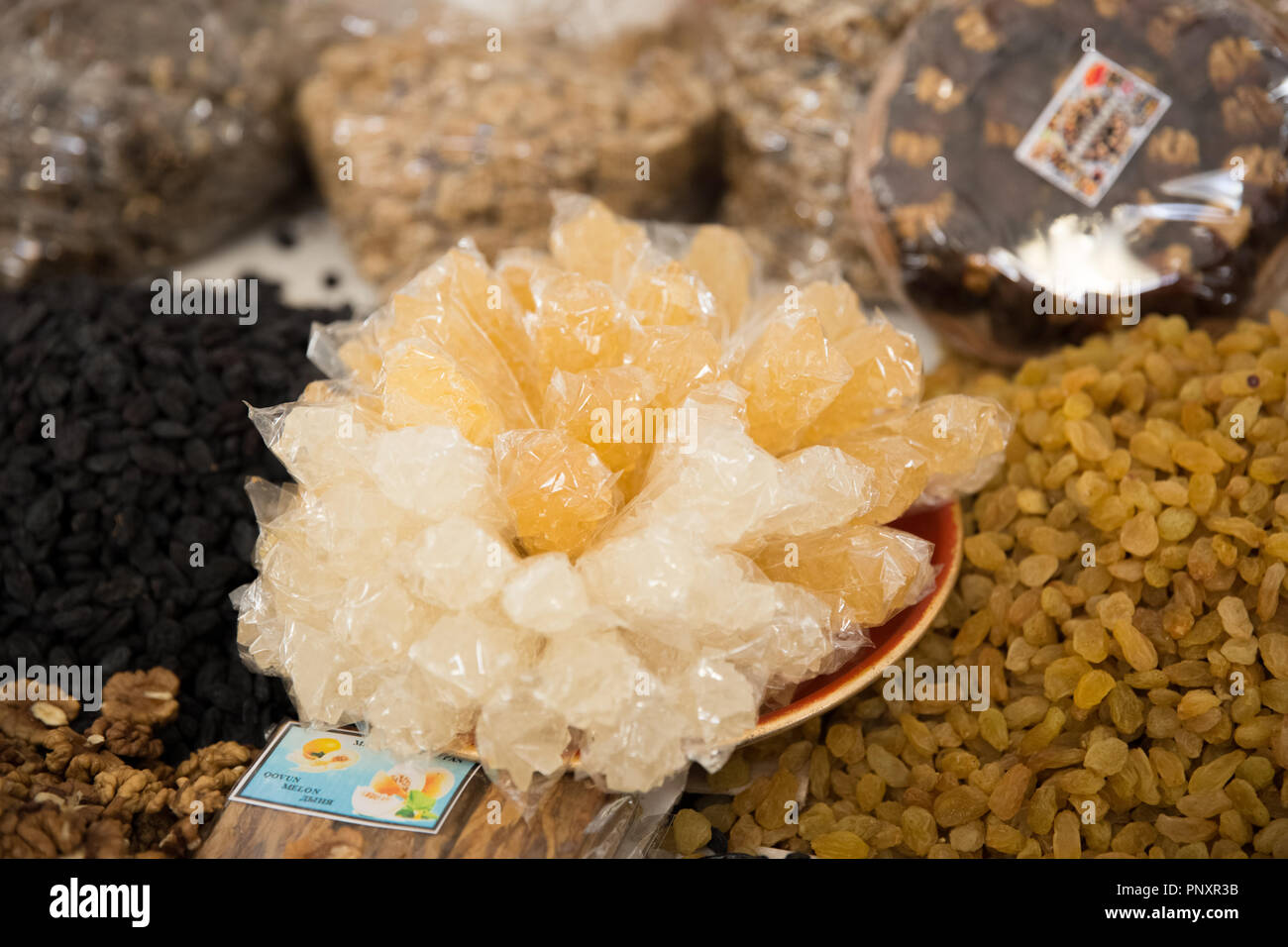 Various dry fruits like dates, figs, pista, dried grapes, almonds and