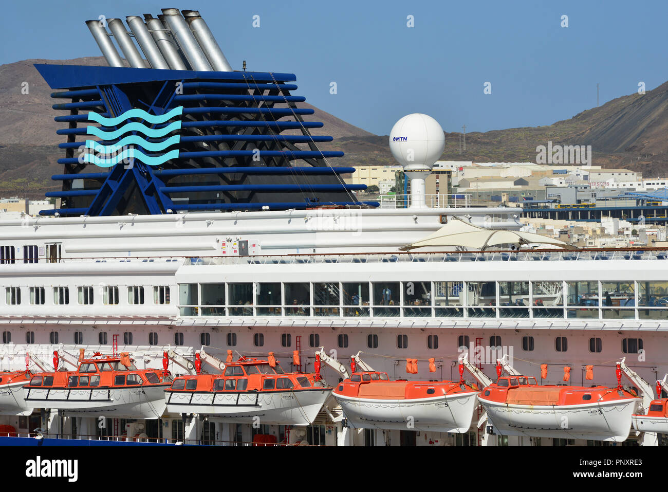 Funnel and upper decks of cruise ship Horizon in dock at Las Palmas de Gran Canaria, Canary Islands Stock Photo
