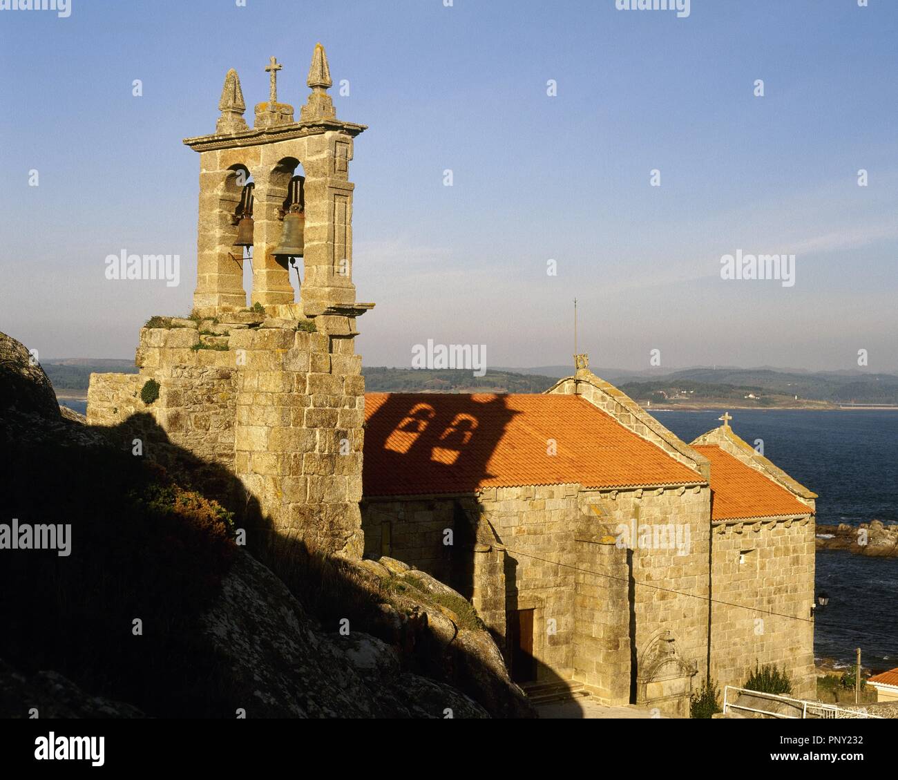 Spain. Galicia. Province of La Coru–a. Muxia. Parish Church of Santa Maria of Muxia. It was built in the 14 century in Gothic sailor style over an earlier temple of the 12th century. Stock Photo