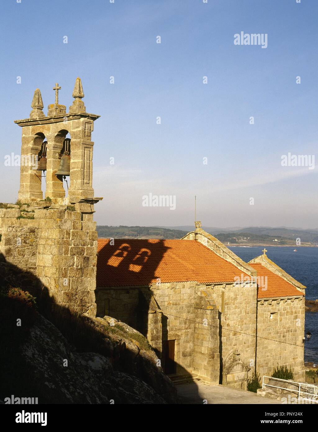 Spain. Galicia. Province of La Coru–a. Muxia. Parish Church of Santa Maria of Muxia. It was built in the 14 century in Gothic sailor style over an earlier temple of the 12th century. Stock Photo