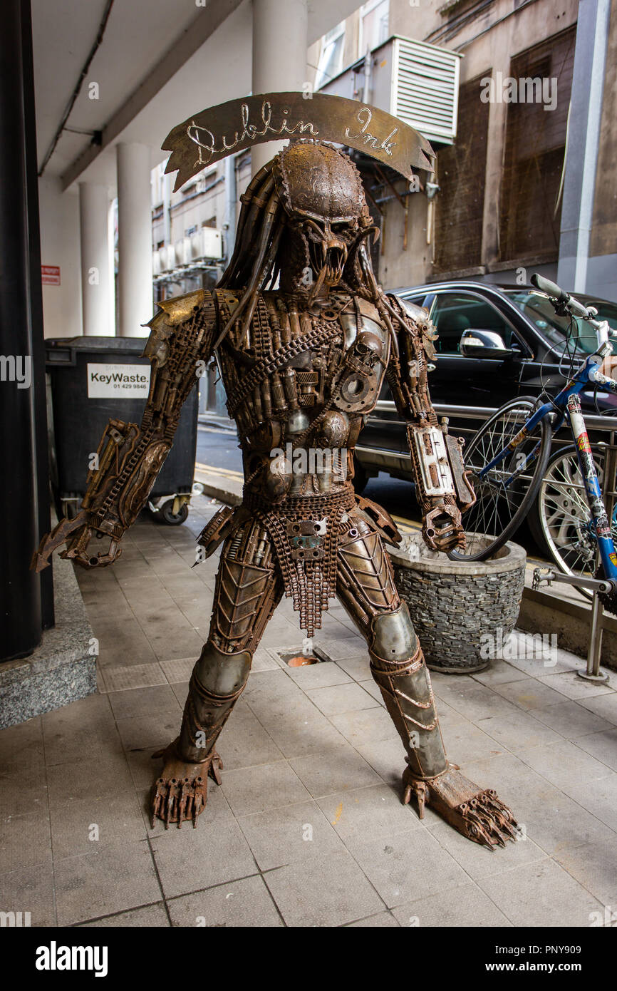 Metal Predator sculpture - the fictional character from the franchise movie with the title standing outside the Tattoo studio in Dublin, Ireland Stock Photo