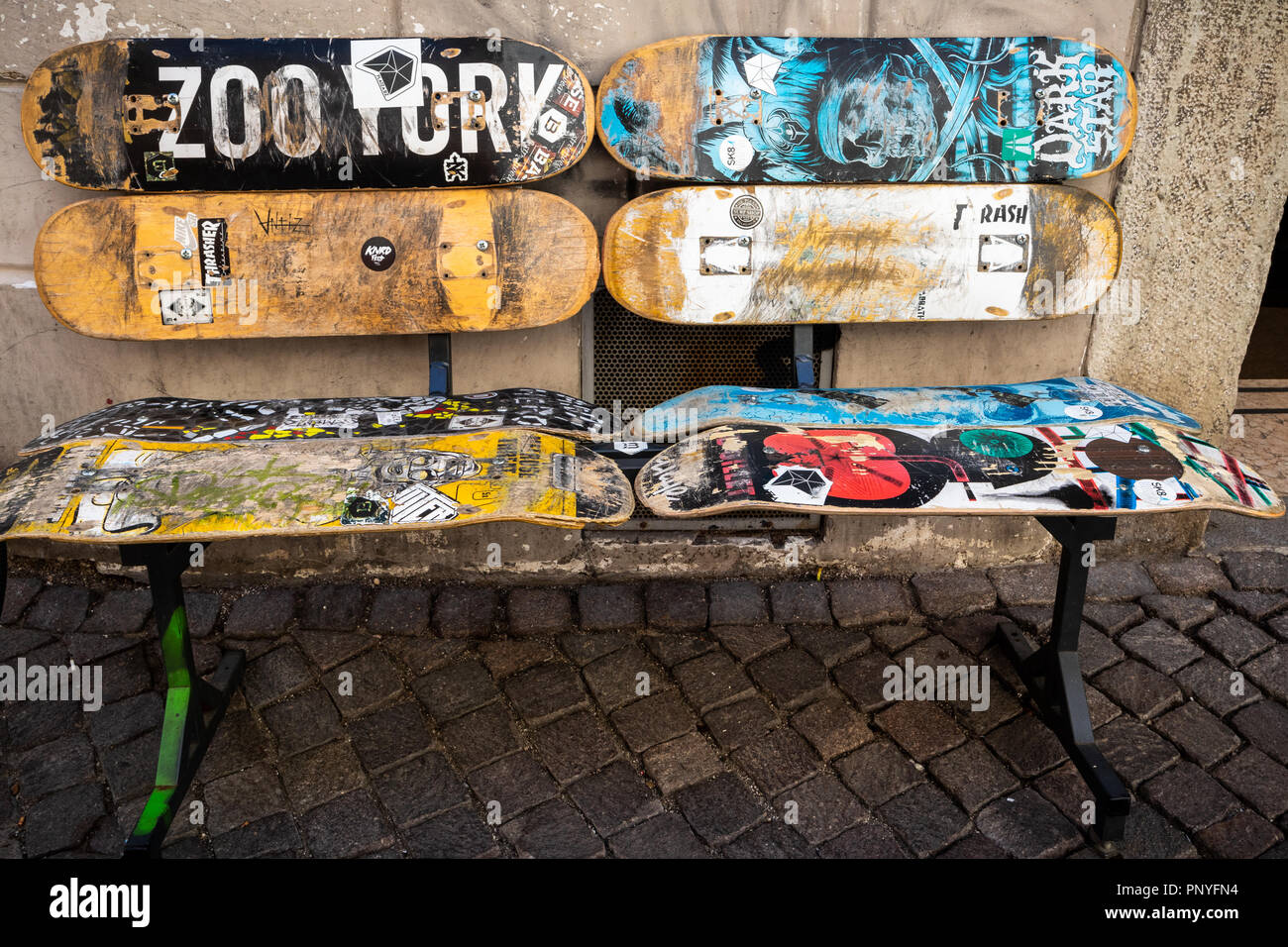 typical urban bench made with old coloured skateboard in val di fassa  dolomites italy Stock Photo - Alamy