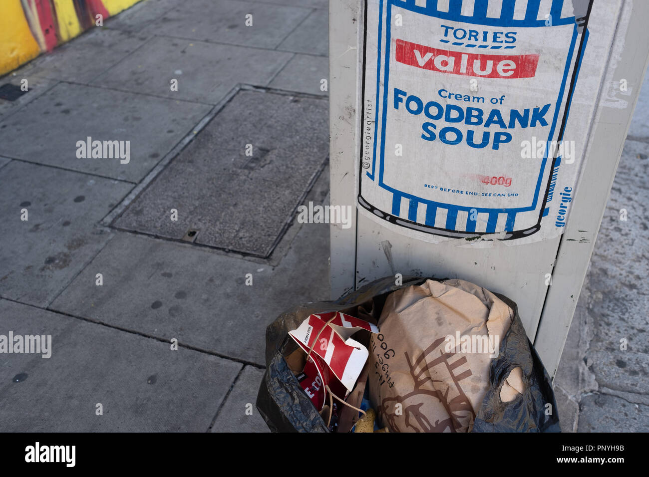 Anti Conservative Party street art highlighting the increasing number of people using food banks in the UK in part caused by austerity. Stock Photo