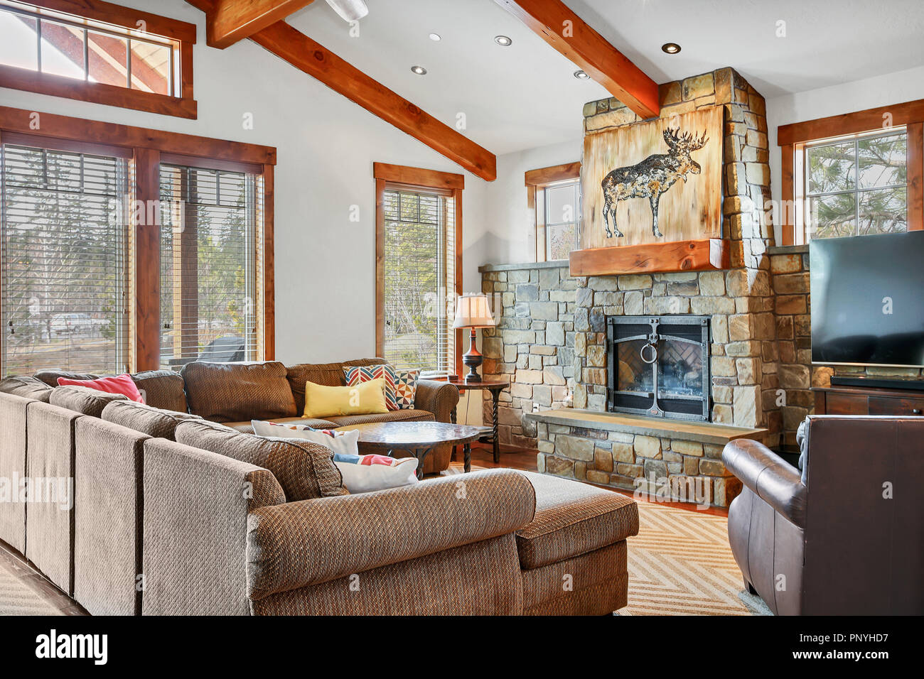 Beautiful Open Plan Home With A Well Styled Living Room Stone