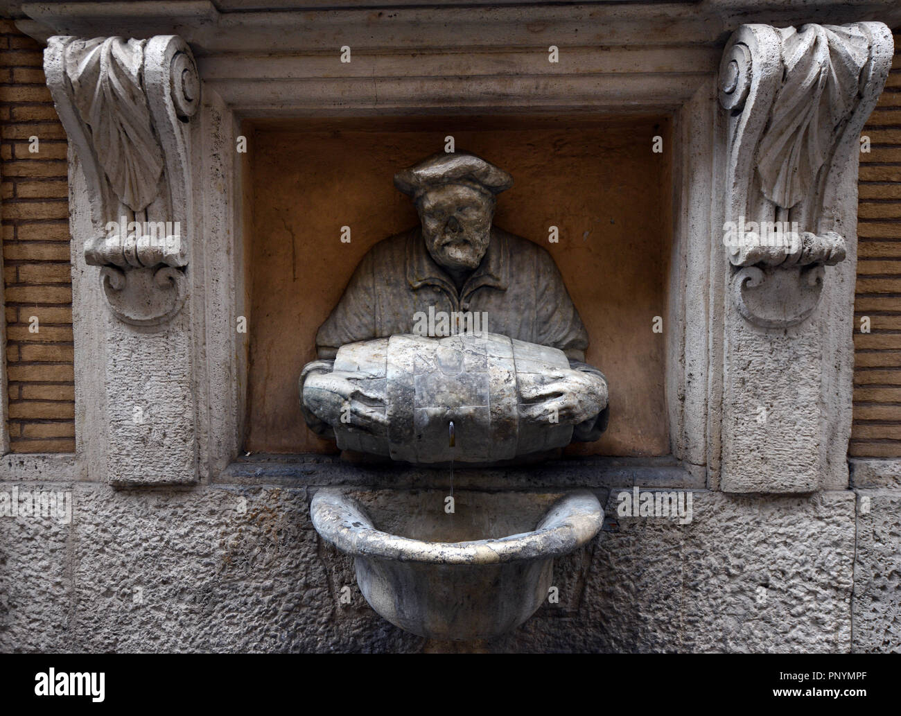 Fontana del Facchino ( The Porter ) is one of Rome's talking statues. Stock Photo