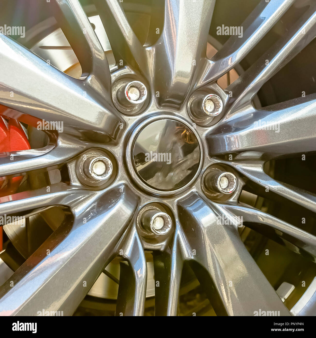 Tire rim with disc brake showing between spokes Stock Photo Alamy