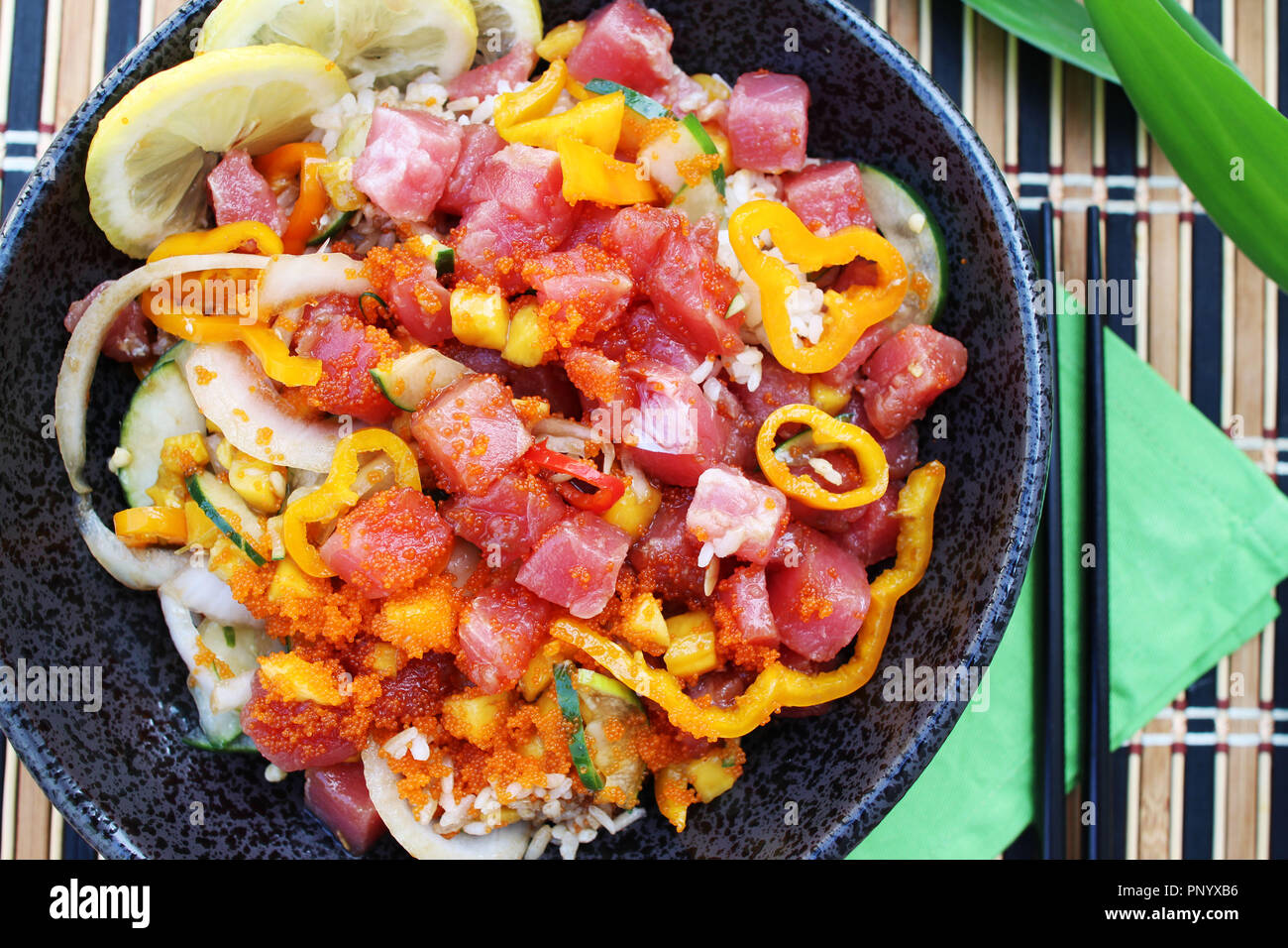 Hawaiian ahi tuna poke bowl served with white rice, vegetables and