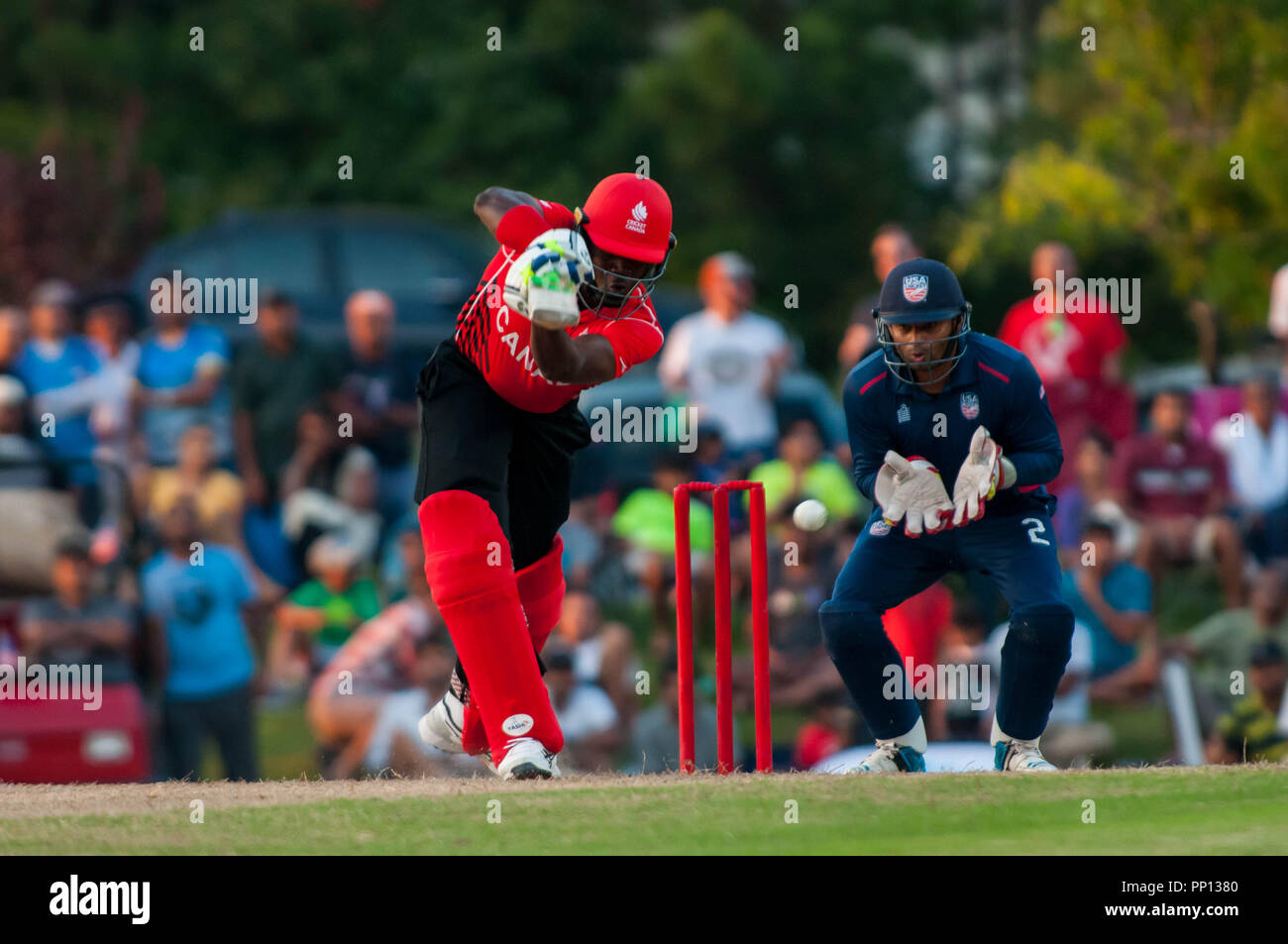 Morrisville, North Carolina, USA. 22nd Sep, 2018. Sept. 22, 2018 - Morrisville N.C., USA - Team Canada ROGRIGO AUSTINE THOMAS (46) in bat with Team USA MOHAMMED KHALEEL (2) as the wicketkeeper during the ICC World T20 America's ''A'' Qualifier cricket match between USA and Canada. Both teams played to a 140/8 tie with Canada winning the Super Over for the overall win. In addition to USA and Canada, the ICC World T20 America's ''A'' Qualifier also features Belize and Panama in the six-day tournament that ends Sept. 26. Credit: Timothy L. Hale/ZUMA Wire/Alamy Live News Stock Photo