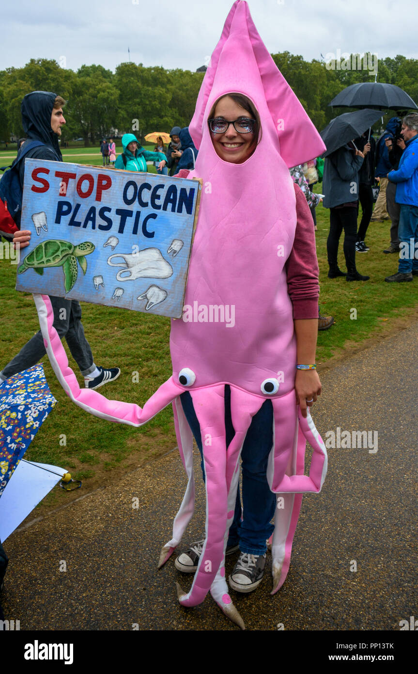 London, UK. 22 September 2018. A woman dressed as a pink octopus holds a poster 'Stop Ocean Plastic'. Several thousands came to a rally in Hyde Park before the march through London on The Peoples Walk for Wildlife set up by naturalist and broadcaster Chris Packham to support the People's Manifesto for Wildlife drawn up by him with the aid of 17 independent experts and scientists aimed at halting the drastic decline in British wildlife. The even was supported by many NGOs, schools and environmental activists.  ( Credit: ZUMA Press, Inc./Alamy Live News Stock Photo