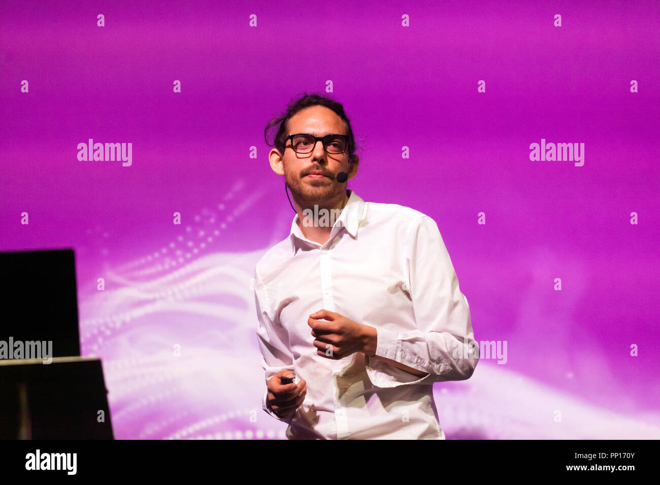 Neuroscientist Chris Timmerman explainibng how psychedelic drugs have been used to explore human consciousness, on the Humans Stage, at New Scientist Live Stock Photo