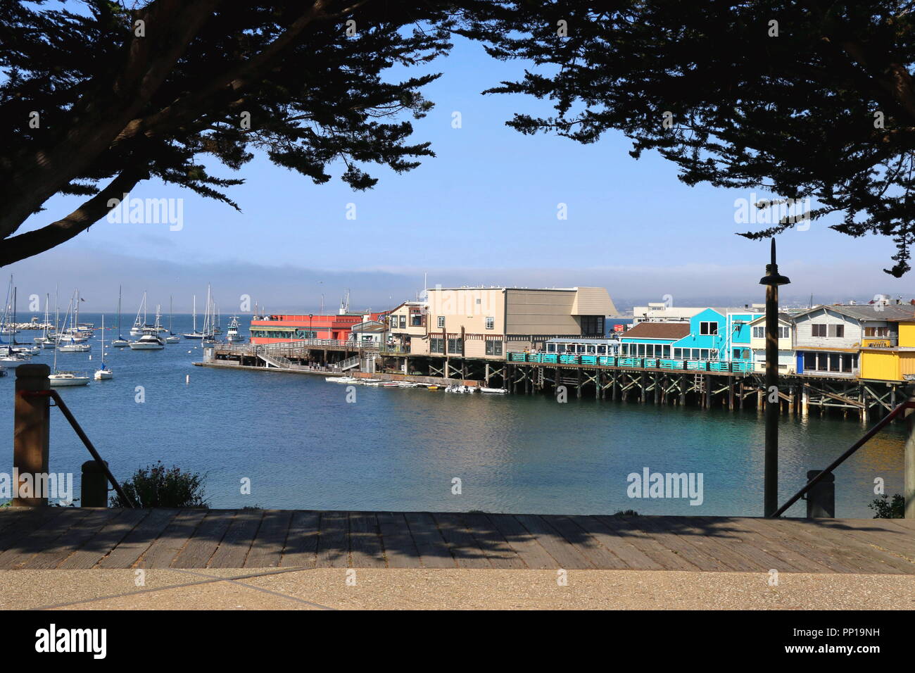Colorful buildings add to the character of Fisherman's Wharf, Monterey CA. Stock Photo