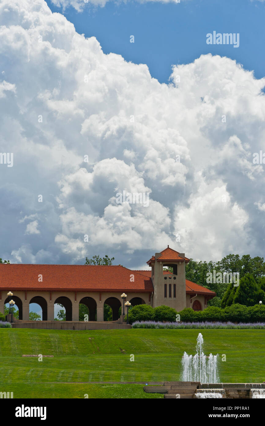 A summer day's moist air produces impressive, billowing cumulus clouds over the World's Fair Pavilion at St. Louis Forest Park. Stock Photo