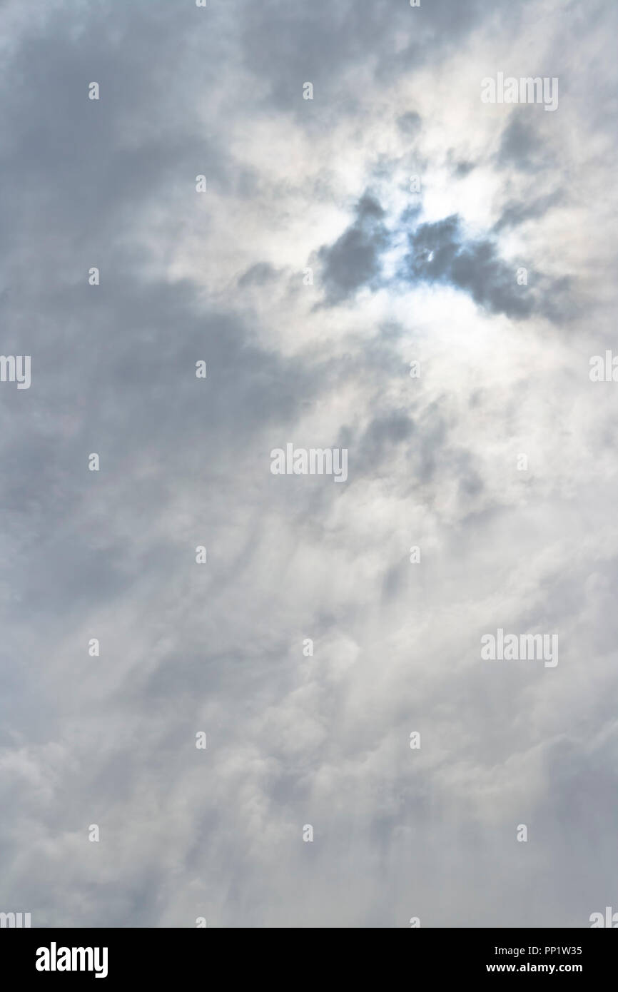 Altostratus clouds play in the midday sun the day before the ides of March. Stock Photo