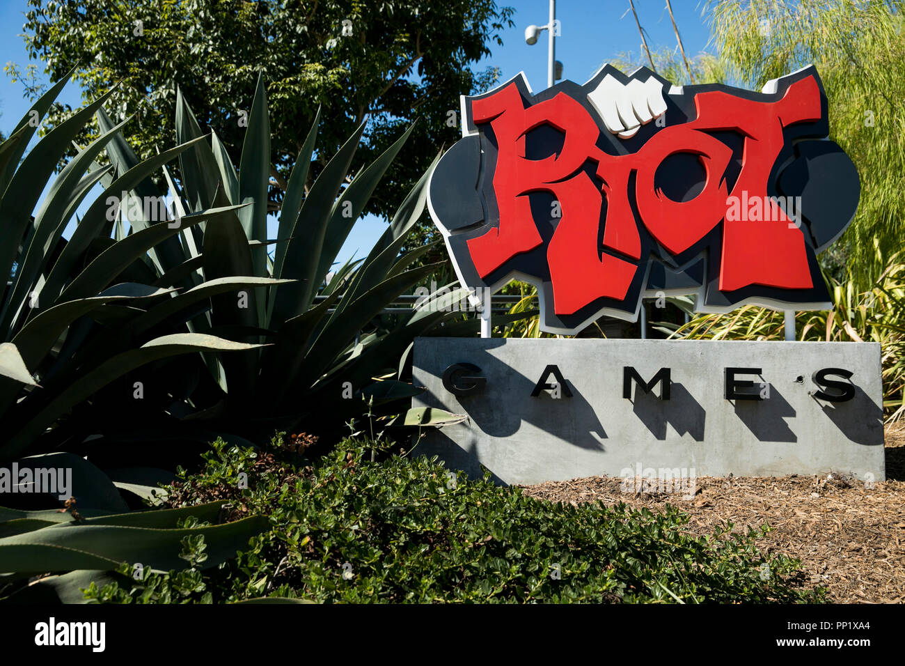 A logo sign outside of the headquarters of Riot Games, Inc., in Los Angeles, California on September 15, 2018. Stock Photo