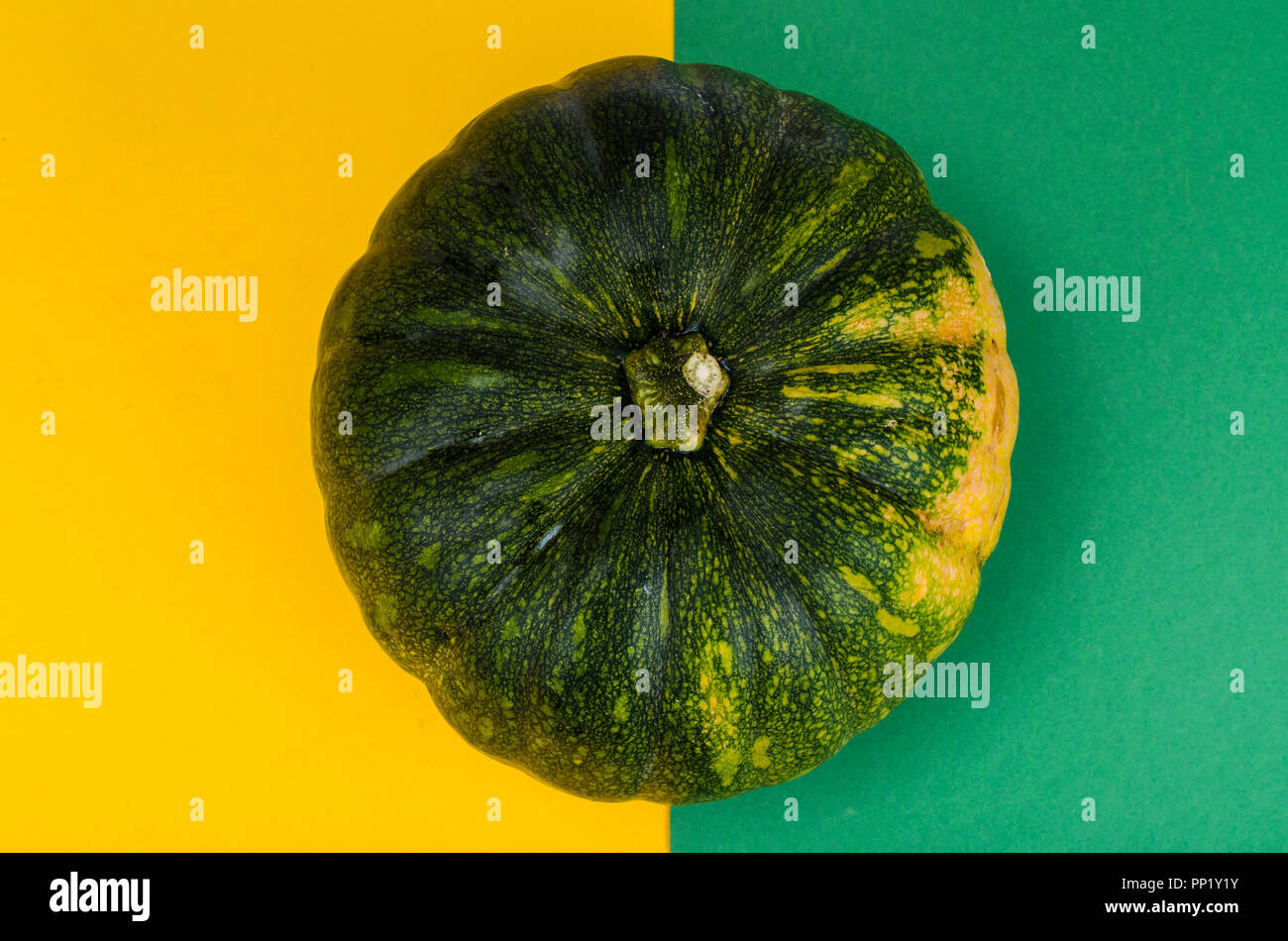 Round pumpkin on bright background with space for text Stock Photo