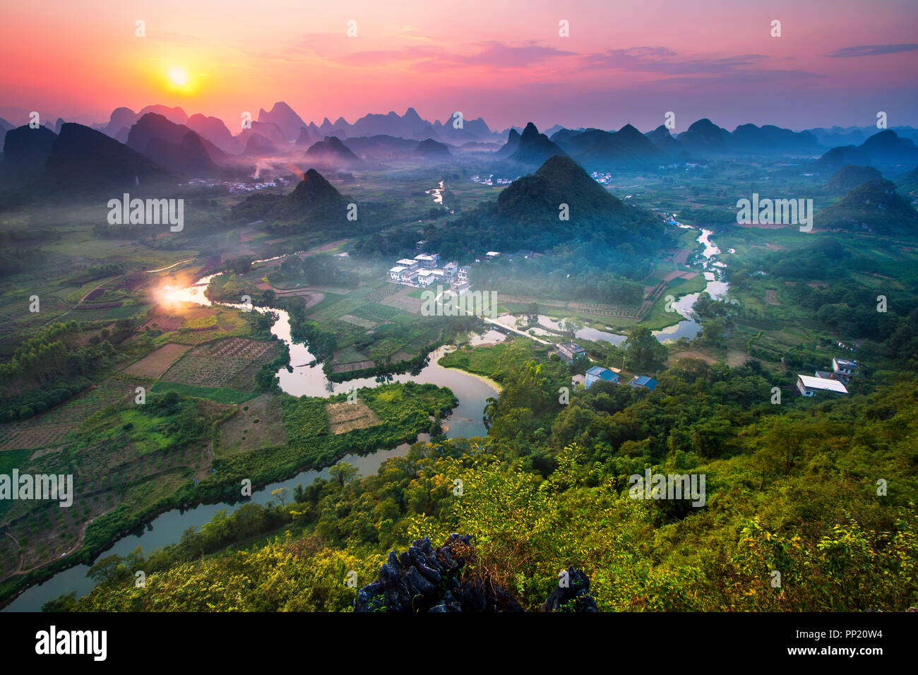 Panorama Landscape of Guilin, China. Li River and Karst mountains called Cuiping or Five Finger mount located at Guangxi Province, China. Stock Photo