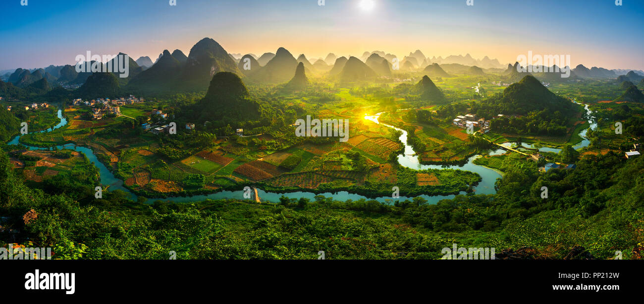 Panorama Landscape of Guilin, China. Li River and Karst mountains called Cuiping or    Five Finger mount located at Guangxi Province, China. Stock Photo