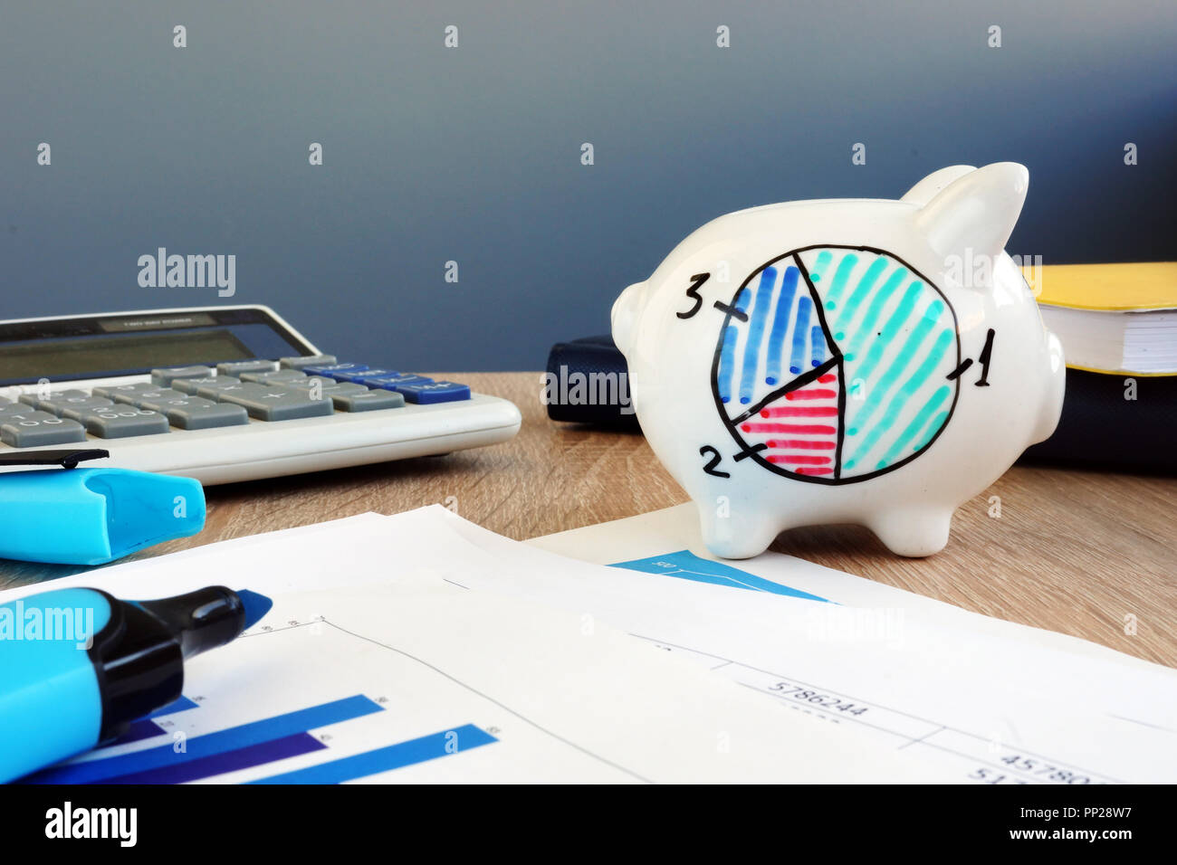 Wealth management. Piggy bank with financial structure of savings. Stock Photo