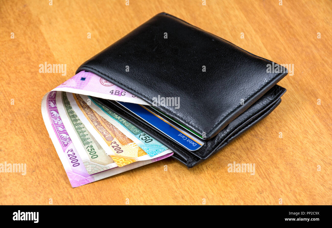 Indian Currency with Purse, Two Thousand and Five Hundred Rupees, Credit Debit Card, Save Money New Currency Stock Photo