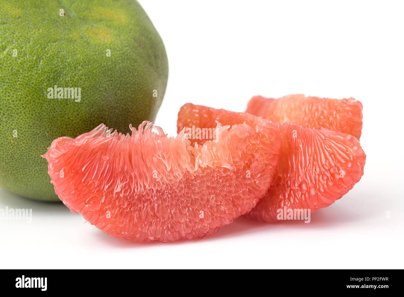 red pomelo pulp fruit isolated on white background Stock Photo Alamy