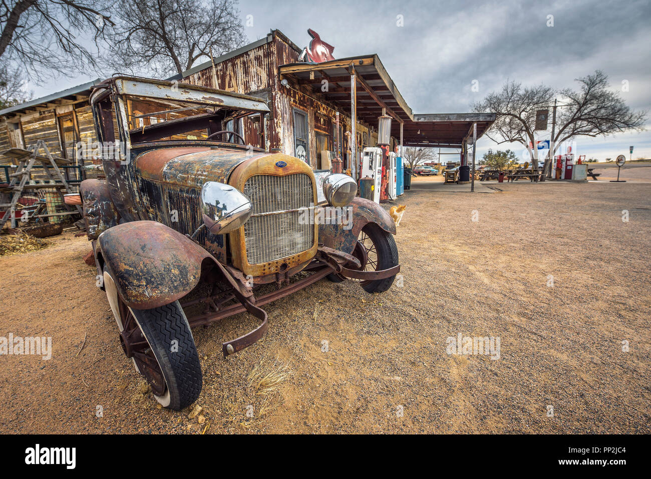 Hackberry, Arizona, USA - January 2, 2018 : Old and rusty Ford car abandoned near the Hackberry General Store. Hackberry General Store is a famous sto Stock Photo