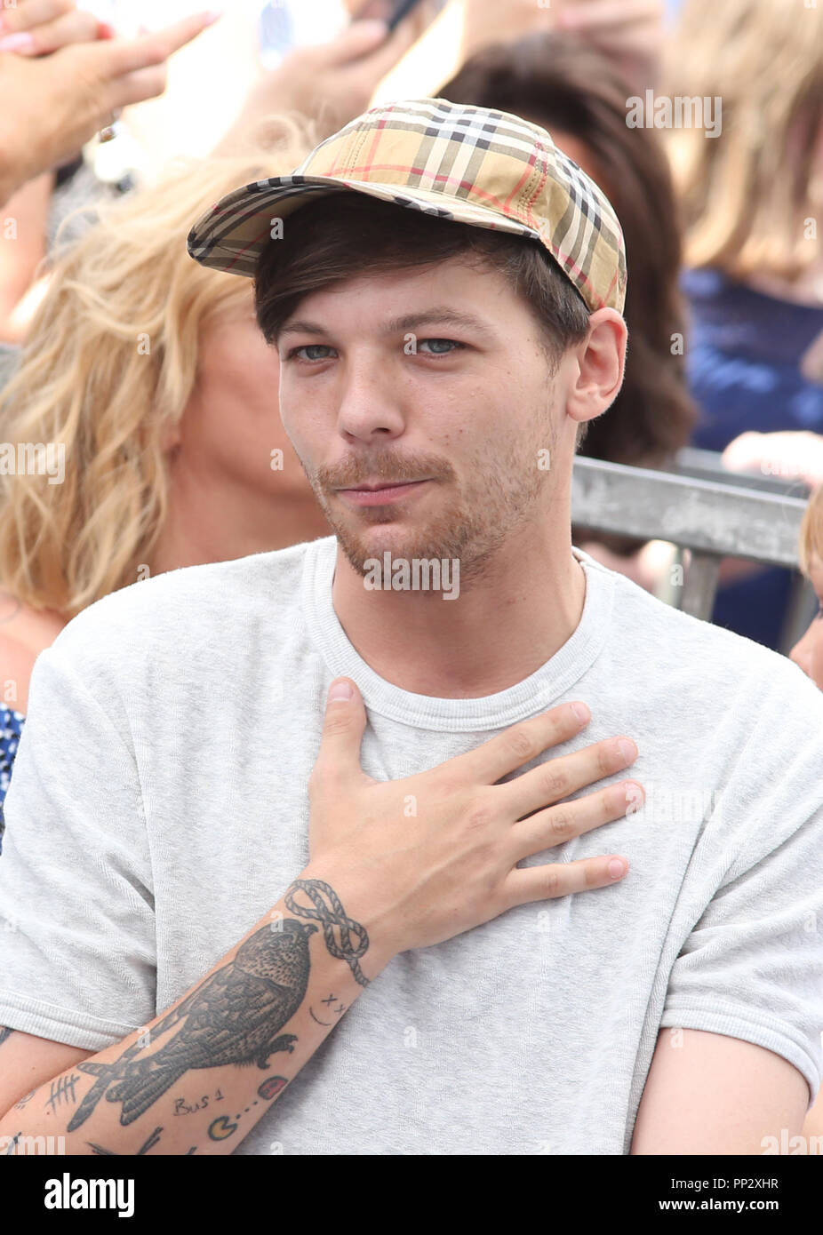 Simon Cowell Honored With Star On The Hollywood Walk Of Fame Featuring