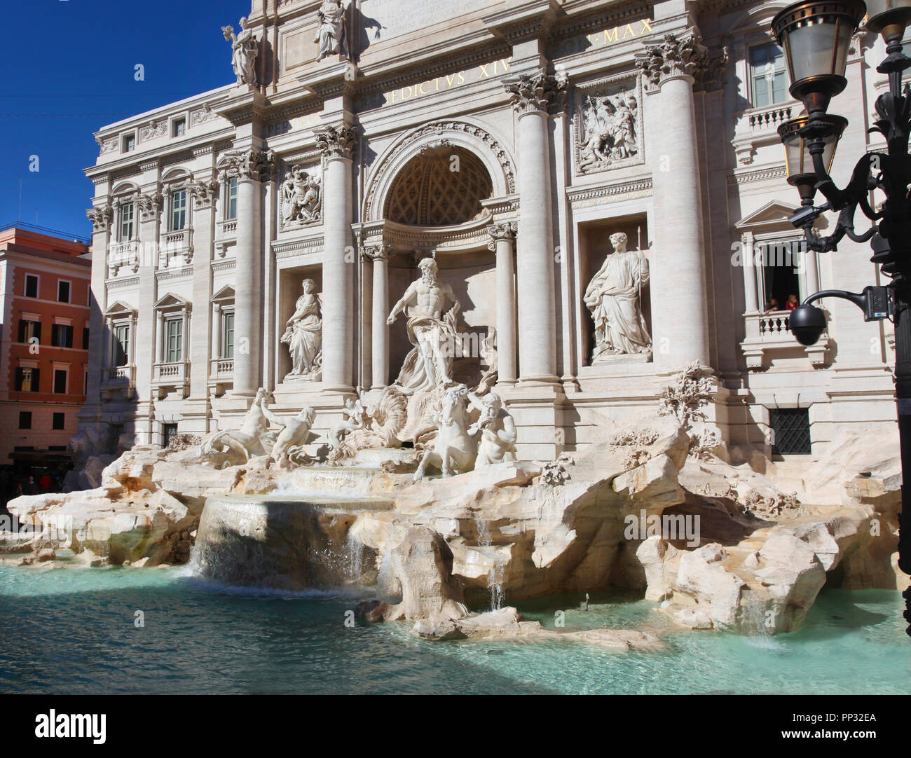 Image of the Trevi Fountain depicting the Taming of the Waters in the Piazza di Trevi, Rome, Italy.The backdrop for the fountain is the Palazzo Poli.  Stock Photo