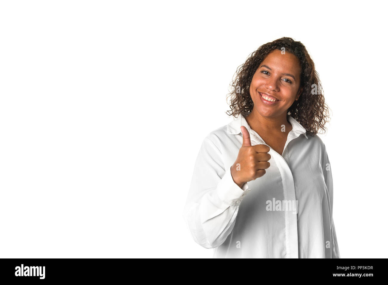Young pretty black woman showing thumbs up sign isolated on a white background Stock Photo