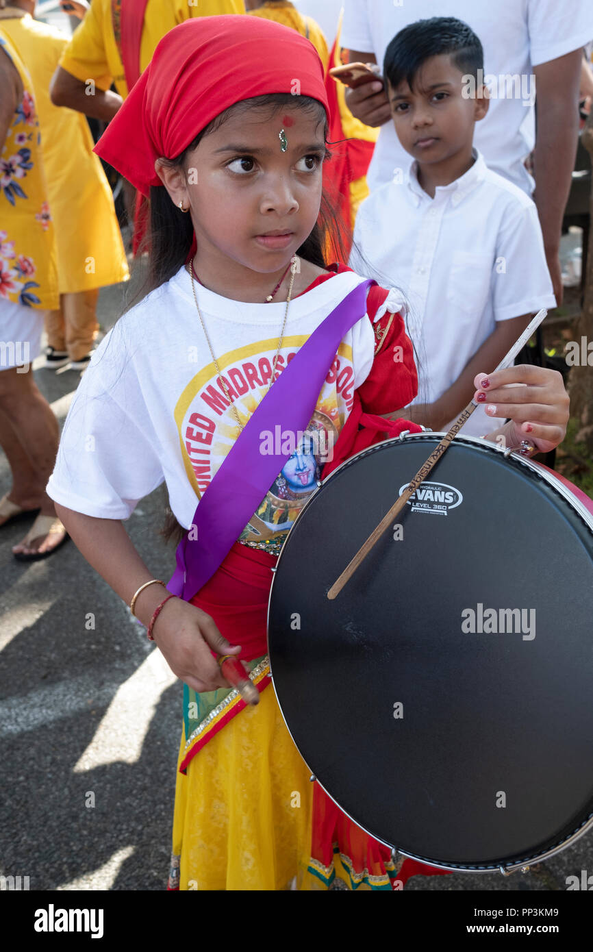 A very cute Hindu preteen drummer. In Smokey Park in South Richmond