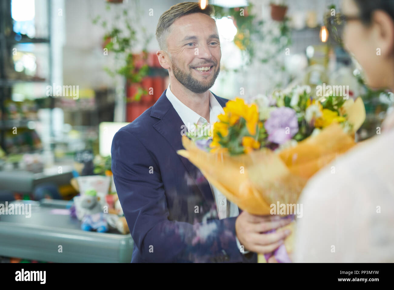 Man selling bouquet flower hires stock photography and images Alamy