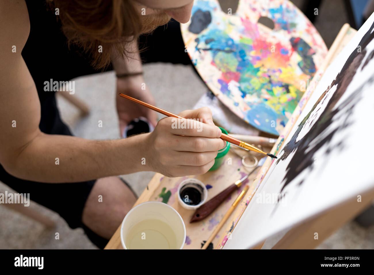 Artist hand holding brush hi-res stock photography and images - Alamy