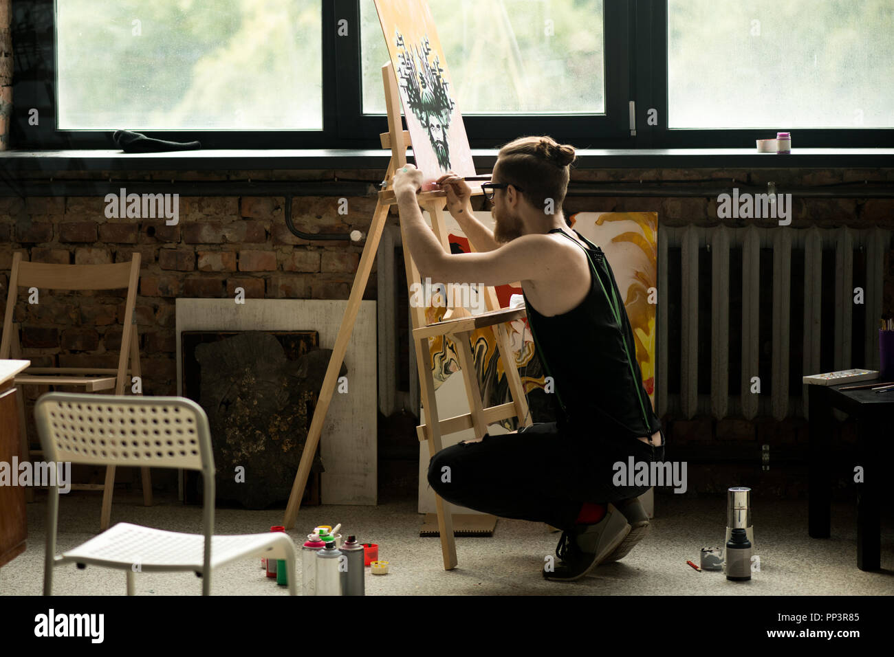 Modern Artist Painting on Easel Stock Photo Alamy